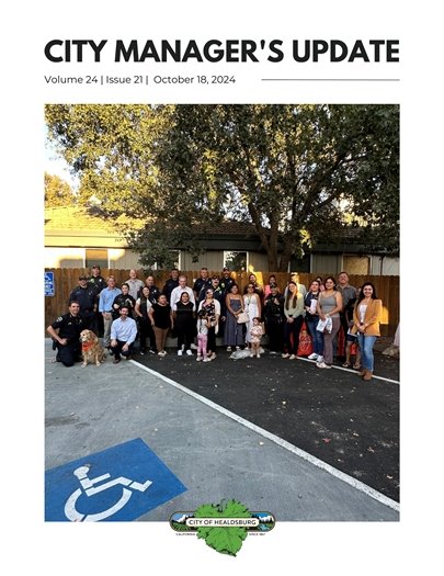 Group of people gathering in parking lot