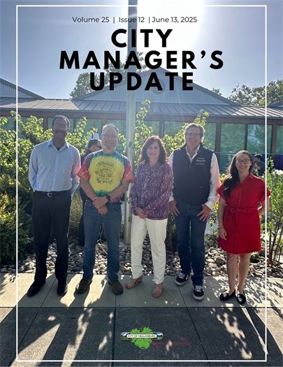 The Cover of the Healdsburg City Manager's Update. Five Councilmembers standing in front of a flag pole.