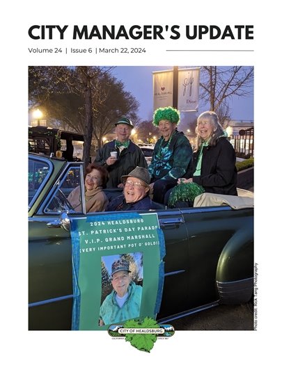 The cover of the Healdsburg City Manager's Update. A group of people sitting in a green car.