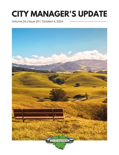 Wooden bench overlooking green hills