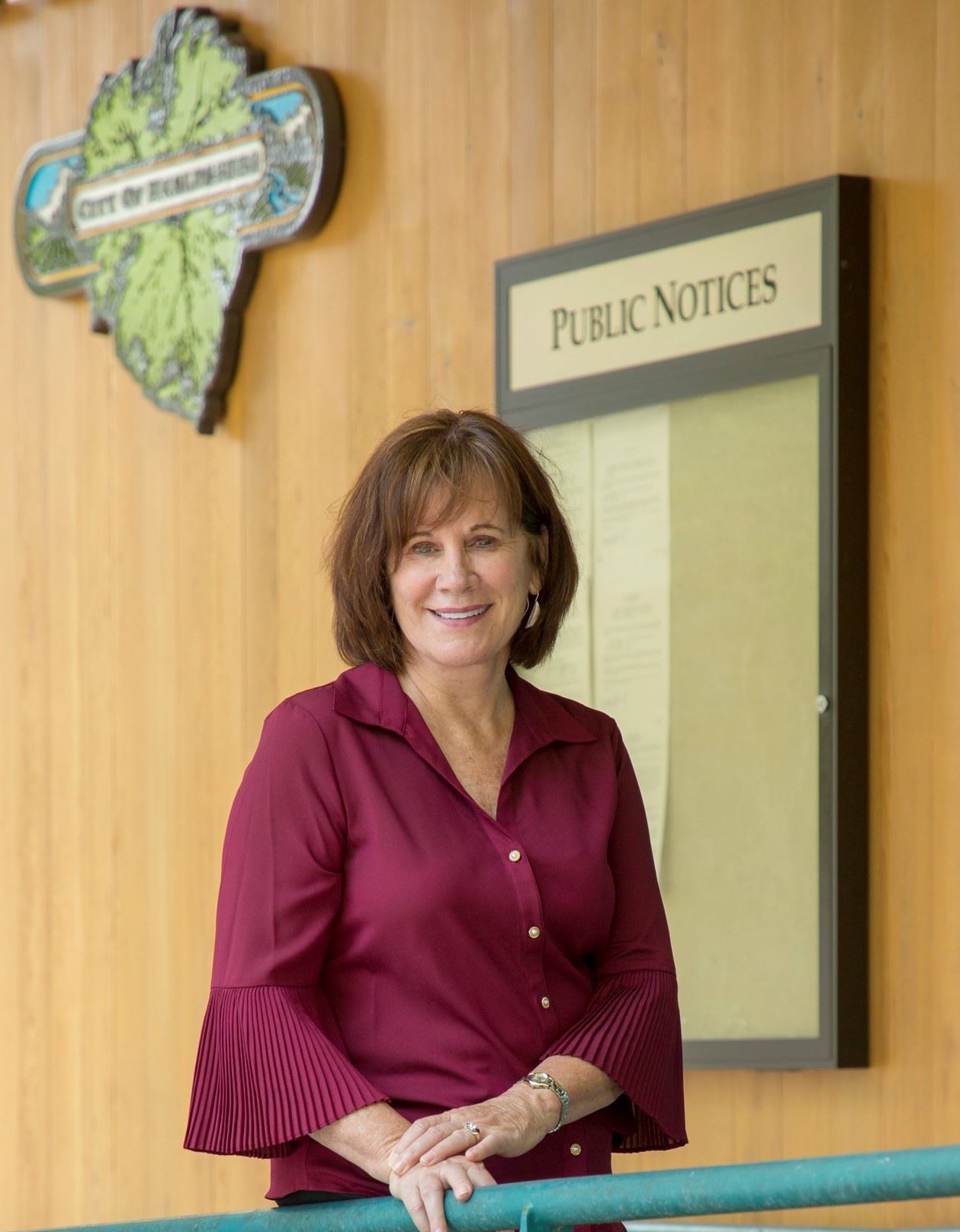 Councilmember Mitchell headshot in front of City Hall